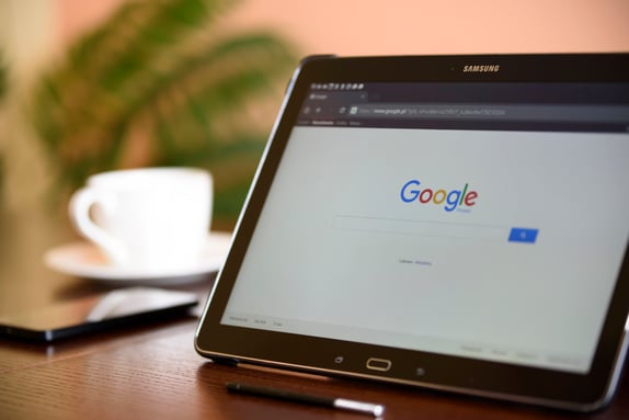 Open laptop displaying Google's search page representing inbound marketing keywords